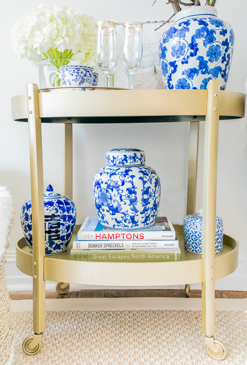 Blue-And-White-Ginger-Jars-On-Gold-Bar-Cart